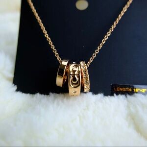 Coach Gold Necklace with Triple Ring Pendant